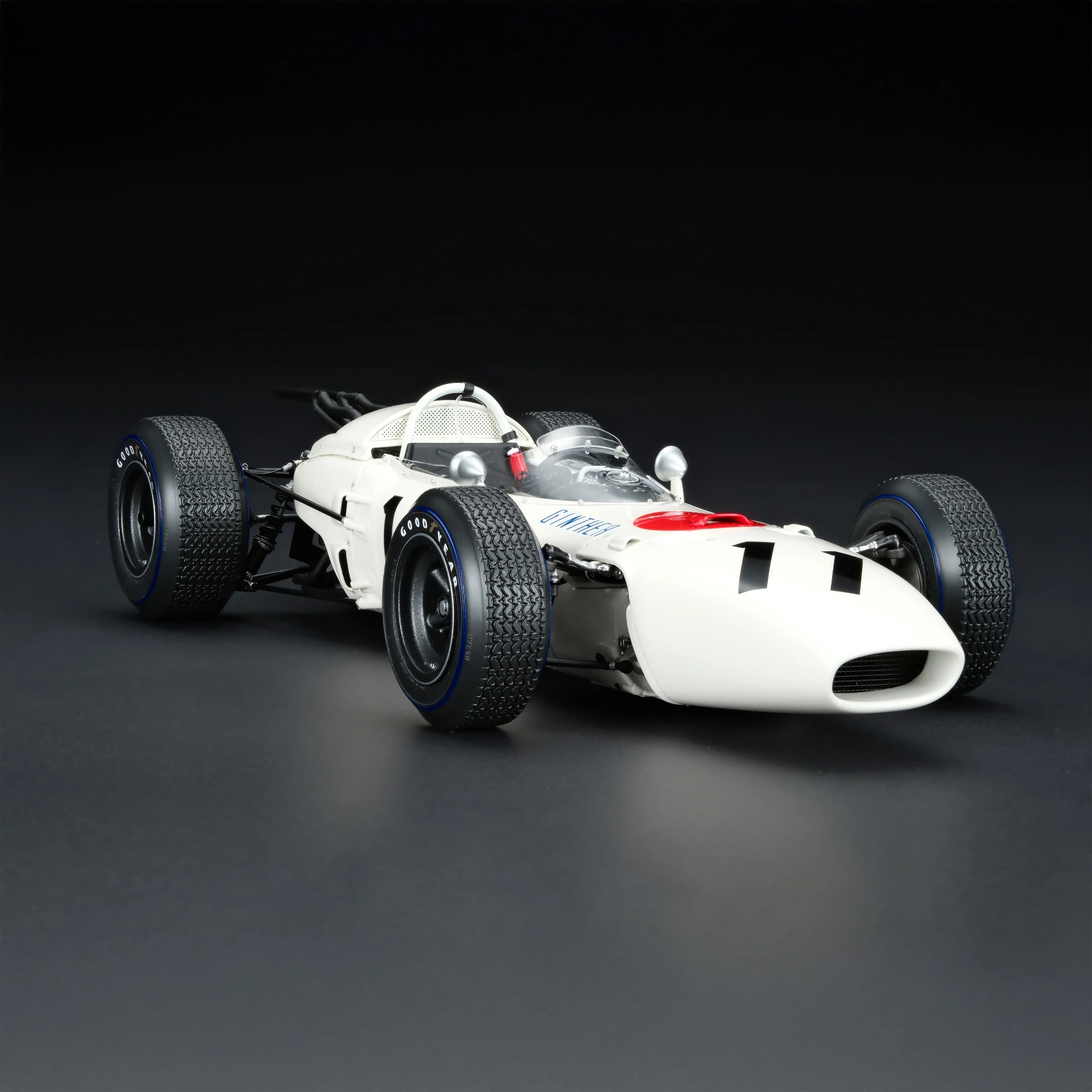 a photo of a scale model of a honda formula 1 race car from the 1960s