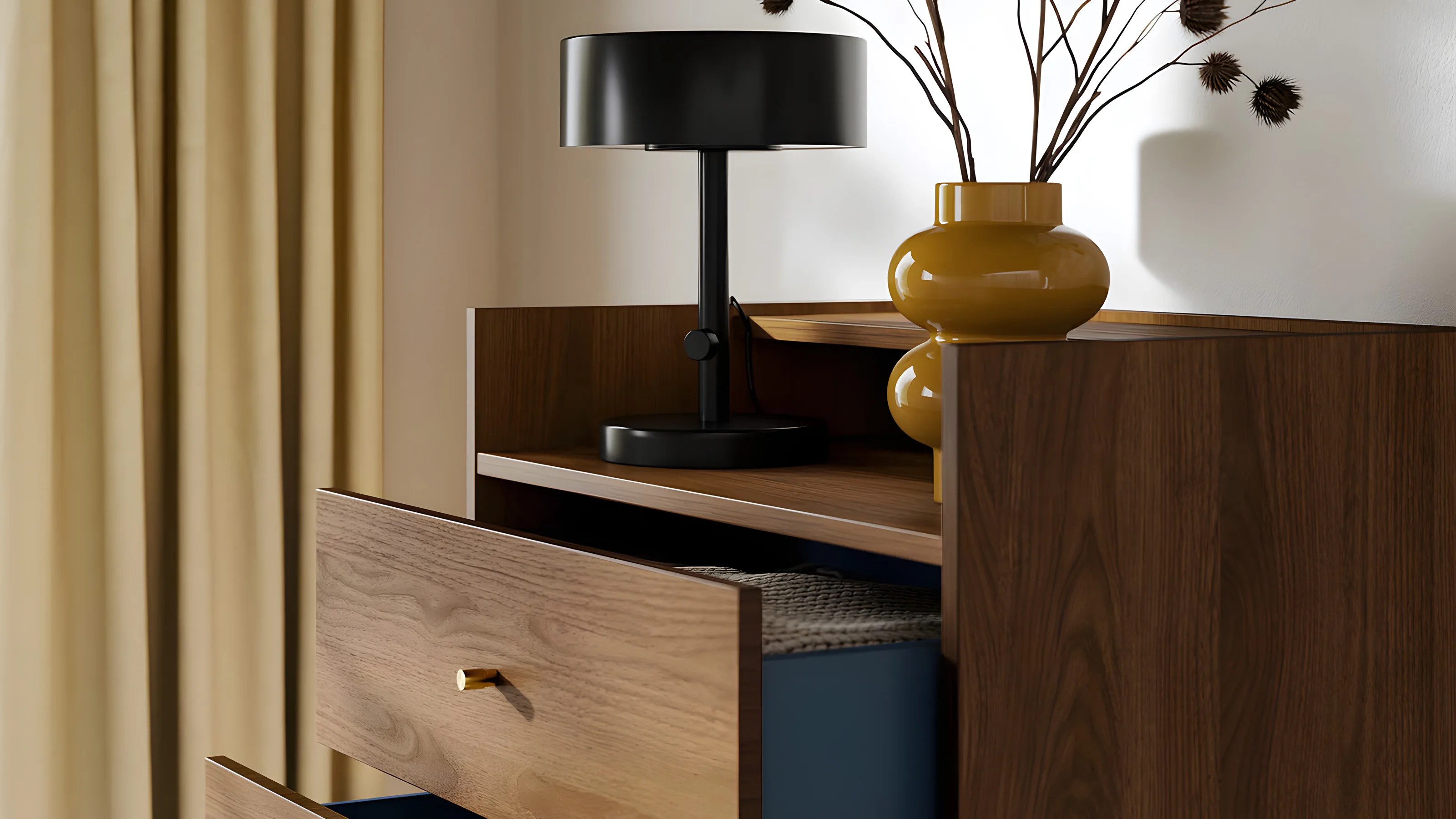 A close-up of the IKEA-RADMANSO 5 drawer dresser showing the top drawer open with a small lamp on the top