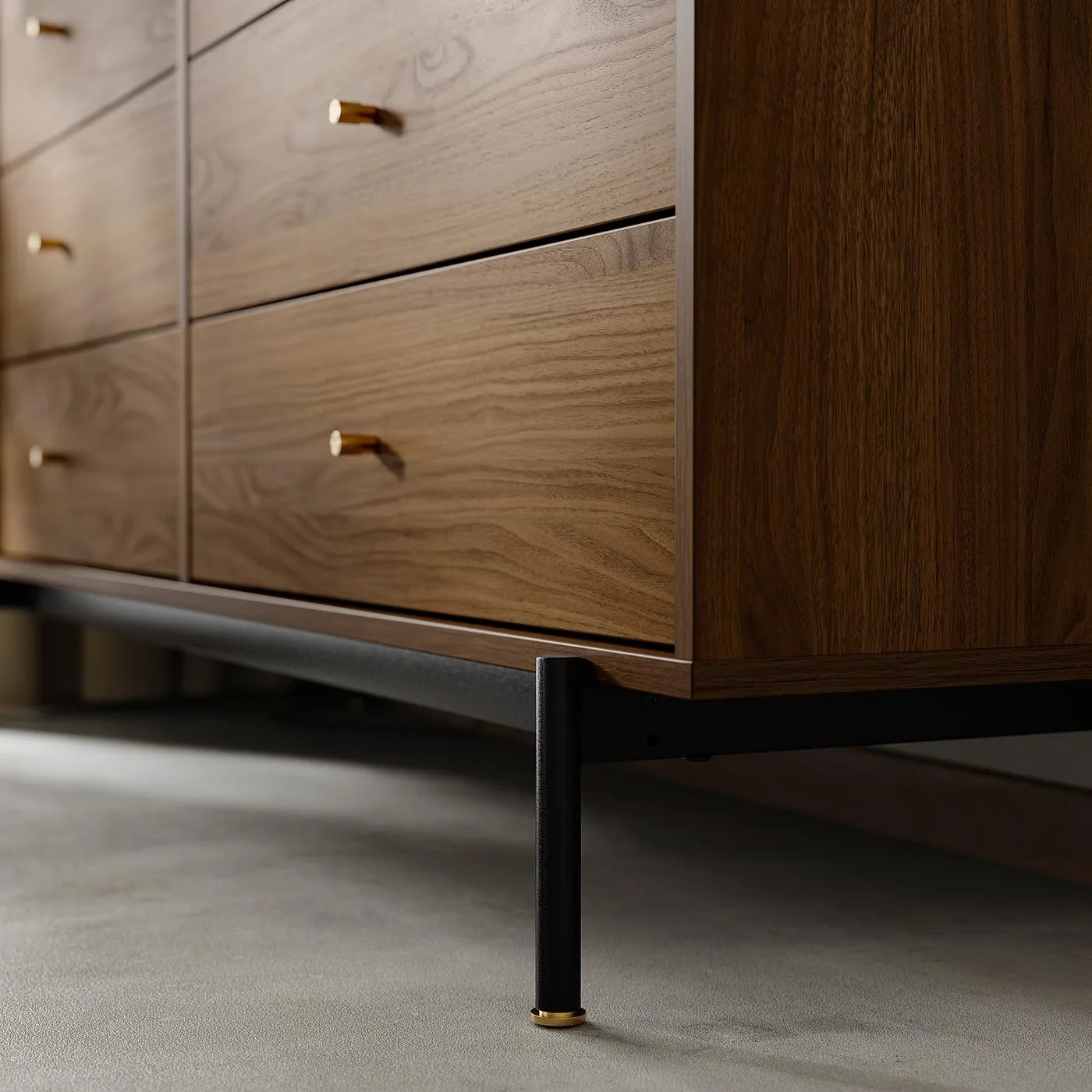 A close-up of the corner and legs of the IKEA-RADMANSO six drawer dresser