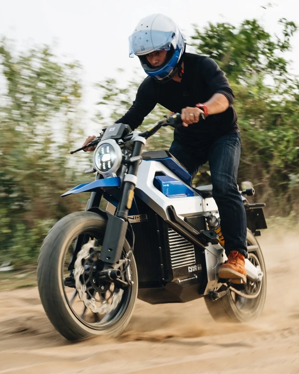 Nuen Moto N1-S electric motorcycle riding in sand