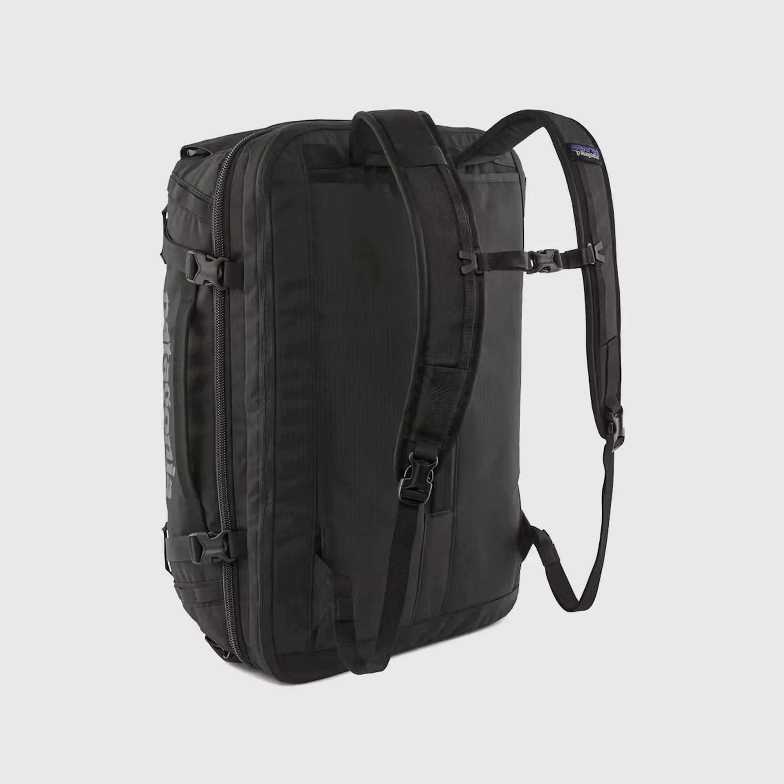 The Patagonia Black Hole MLC 45L backpack in black shown with the straps extended