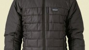 Black Patagonia quilted jacket with a front zipper and zippered chest pocket. The jacket has a rectangular stitched pattern and the Patagonia logo on the left chest.