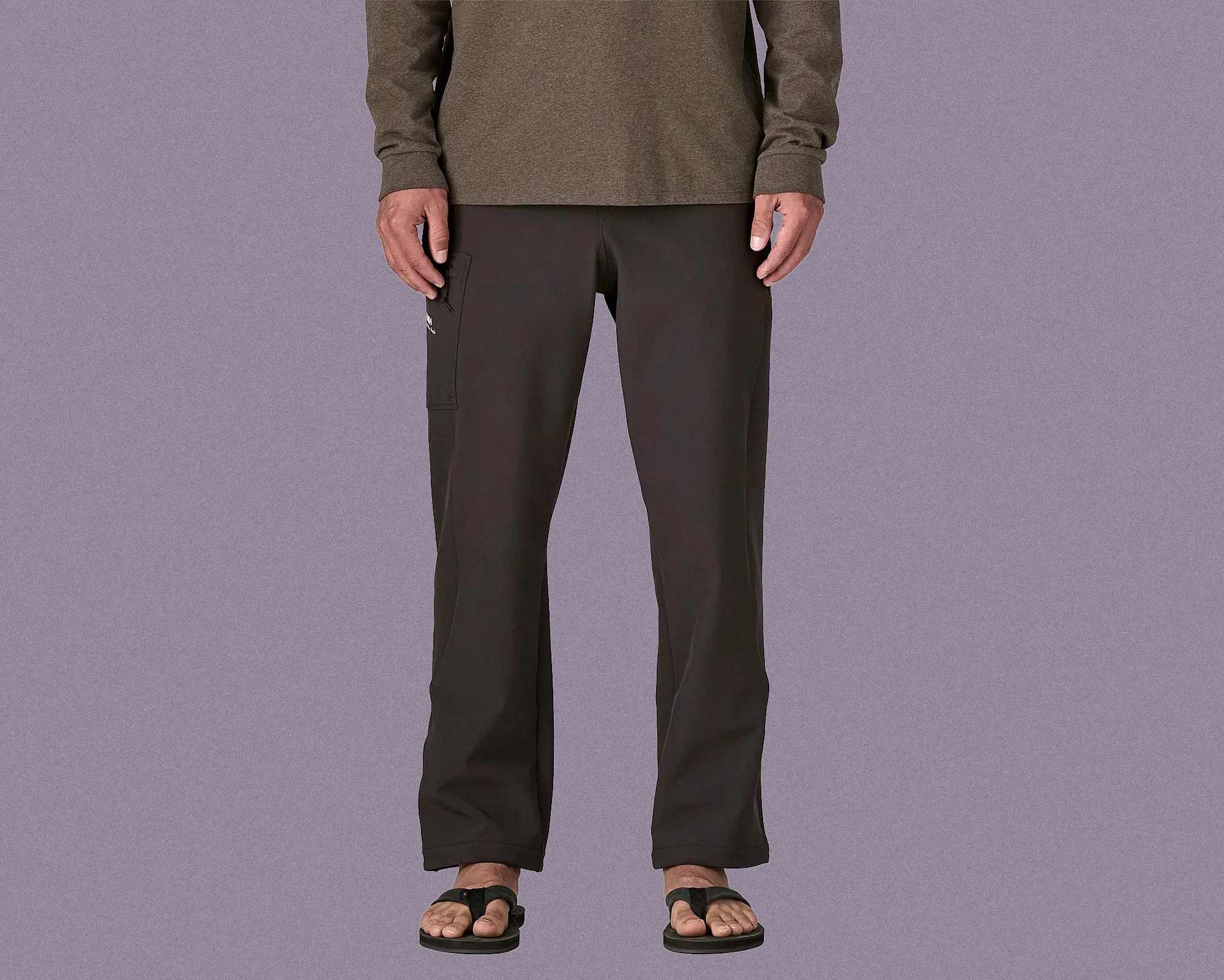 Black straight-leg pants with a side cargo pocket on the right thigh, worn with black sandals and a long-sleeve brown top.