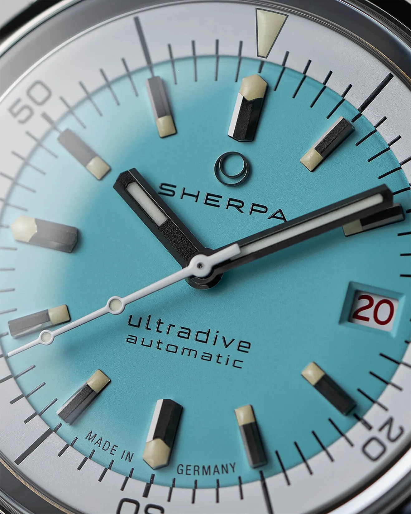 the blue dial of a sherpa dive watch