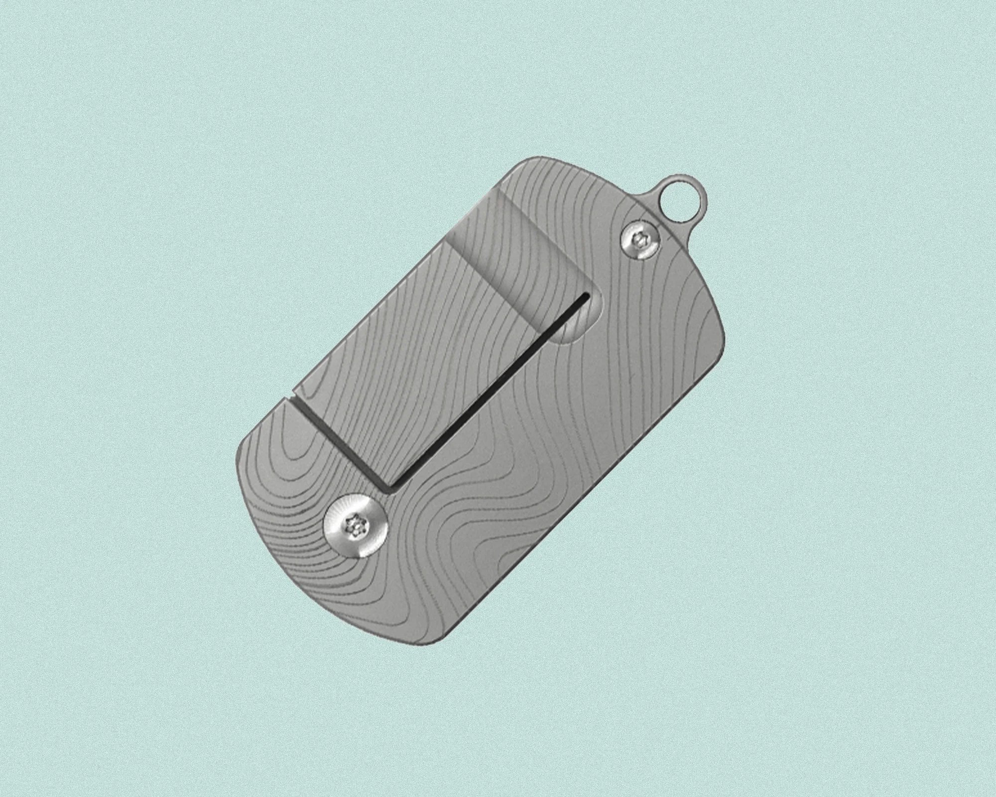 A gray, rectangular metal object with rounded edges and a subtle topographic line pattern. It has two visible screws, one near the bottom left corner and one near the top right corner, and a small circular loop at the top right. There is a narrow, black slot running vertically near the center. The background is a solid light blue color.