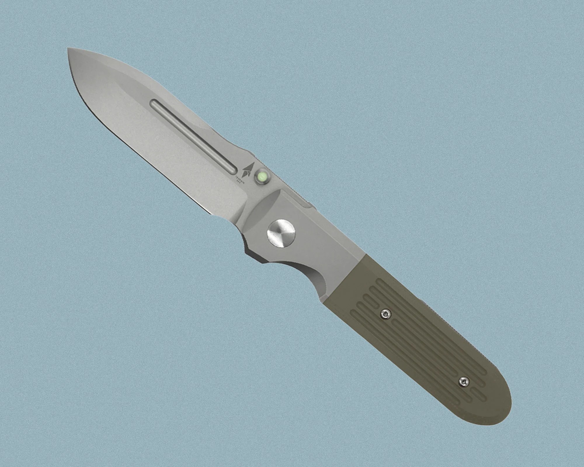 Folding knife with a stainless steel blade and an olive green textured handle. The blade has a groove near the spine and a small circular button near the pivot point. The handle has two visible screws and a rounded end. The background is a solid light blue color.