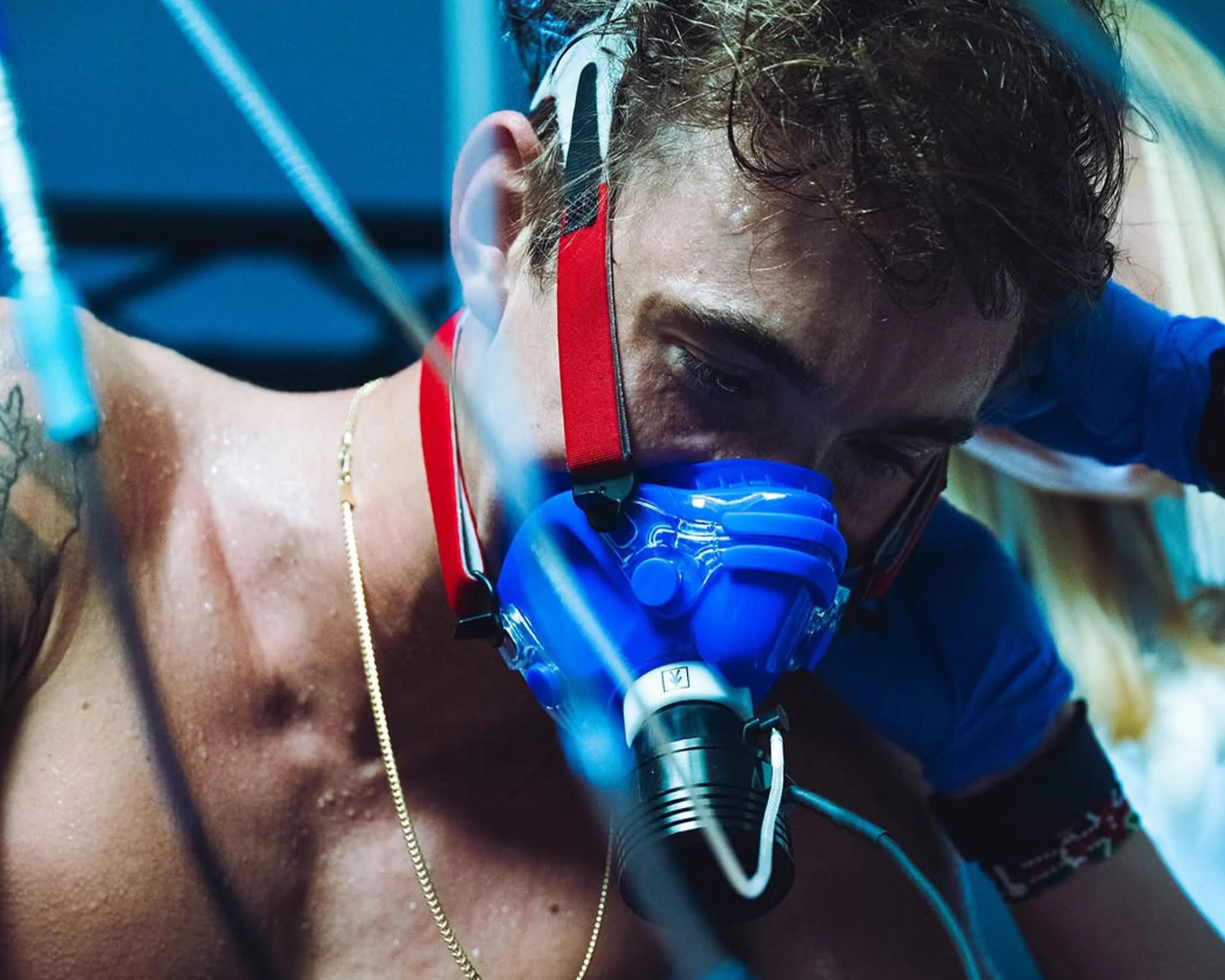 person wearing a VO2 mask