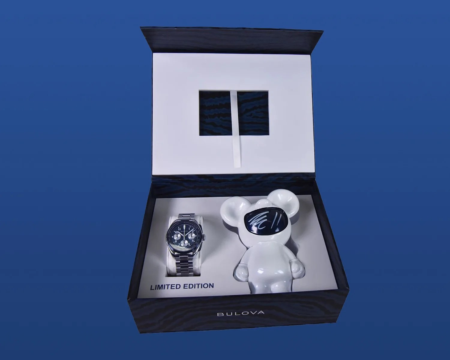 a bulova watch and toy in a box