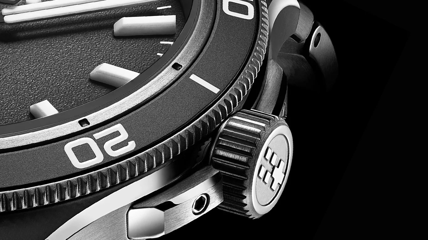 a closeup of a christopher ward dive watch