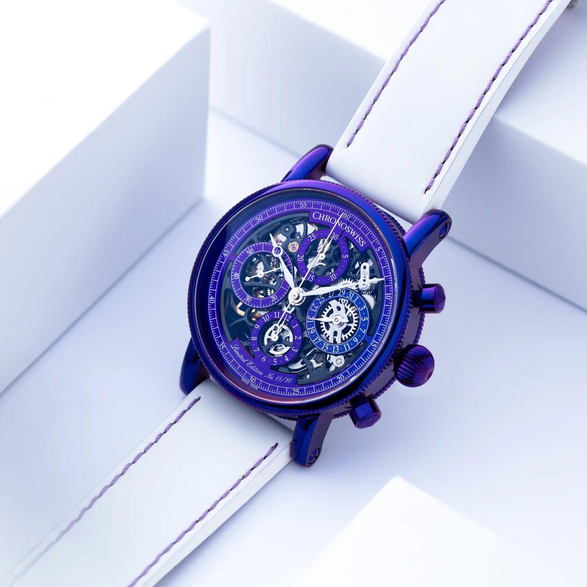 Chronoswiss wristwatch with a vibrant purple skeleton dial showcasing intricate gears and mechanisms. The watch features multiple subdials and white hands, encased in a matching purple case. It is paired with a white leather strap accented by purple stitching. The watch is labeled as a limited edition, numbered 15 out of 30.