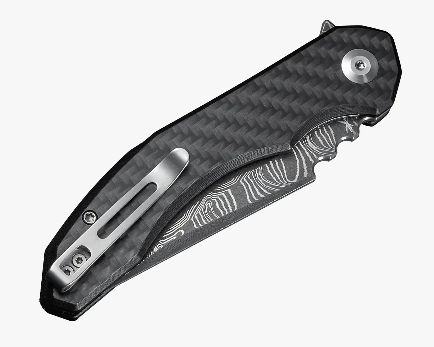 Folding pocket knife with a carbon fiber handle and a partially visible Damascus steel blade featuring a distinctive wavy pattern. The handle includes a metal clip for pocket attachment and a pivot screw near the blade's base. The knife is shown in a closed position.