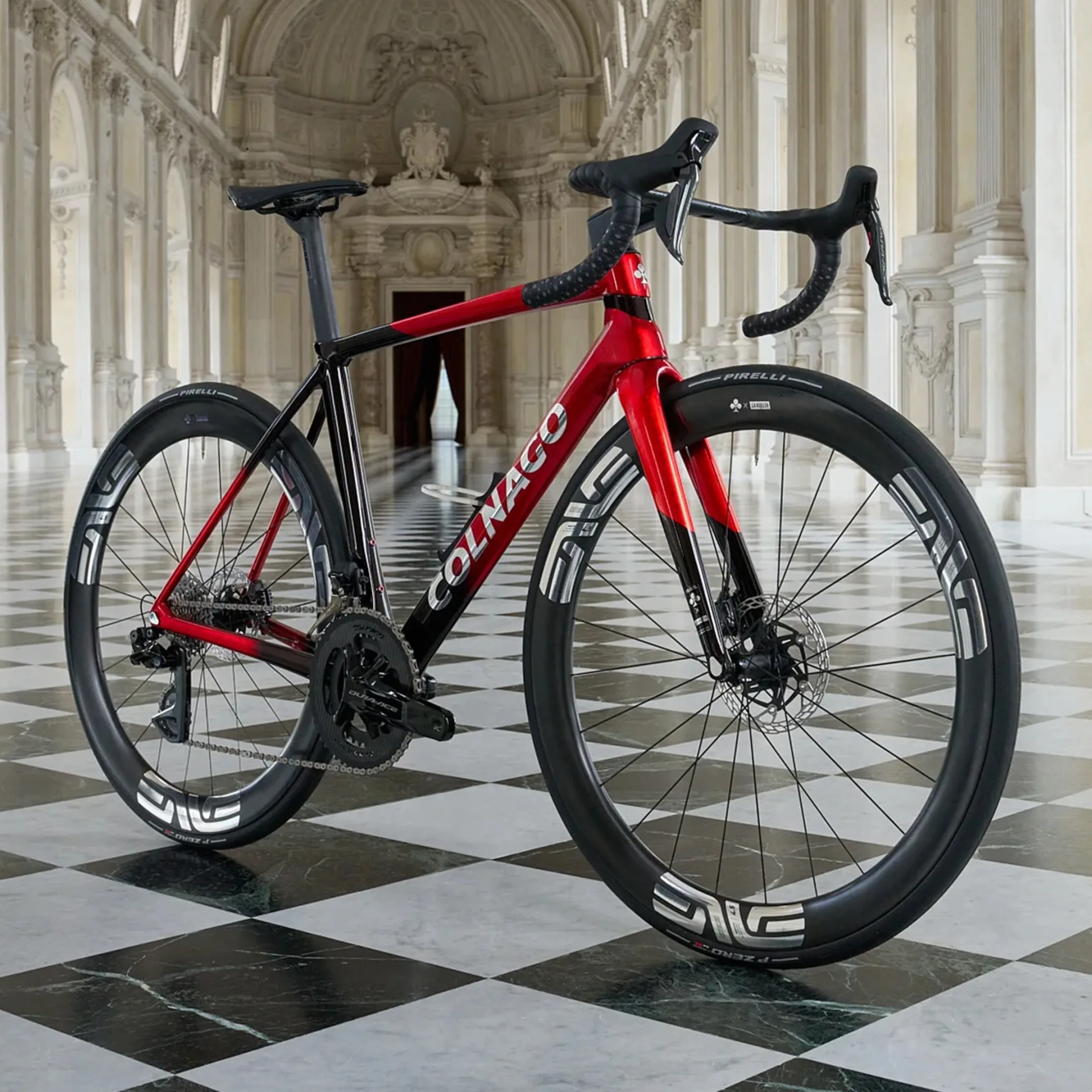 Red and black Colnago road bike with deep-section ENVE carbon wheels, set on a black and white checkered marble floor inside an ornate, classical building with tall columns and arched ceilings.