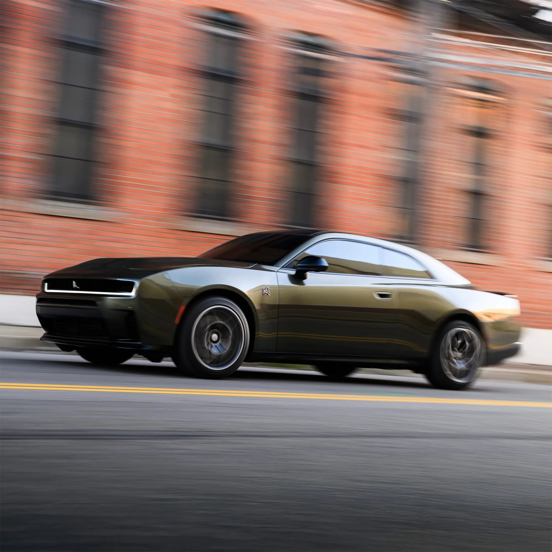 a photo of a gas-powered dodge charger driving