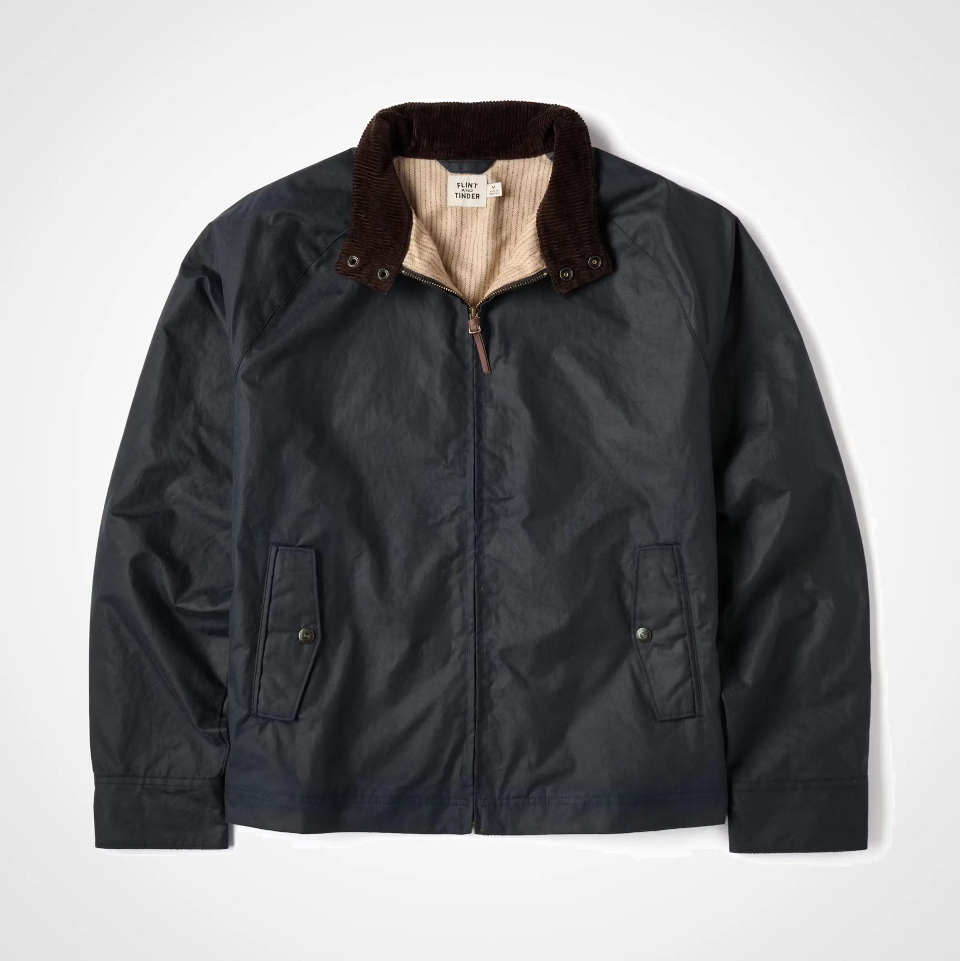 a blue waxed harrington jacket