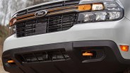 a close-up photo of a Ford maverick tremor grile