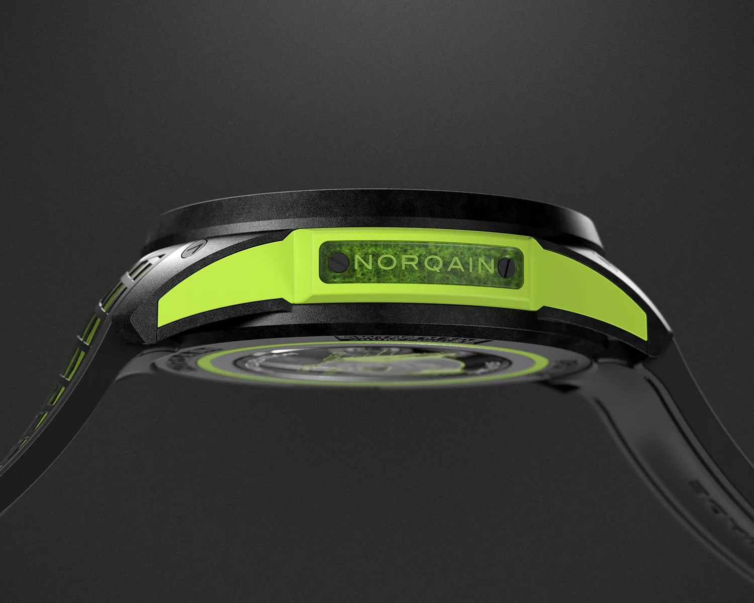 Side view of a black and neon green Norqain wristwatch, showcasing the brand name "NORQAIN" on a neon green plate embedded in the watch case. The watch strap is black with neon green accents.