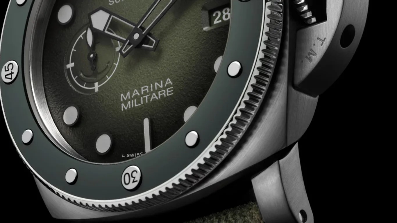 a closeup of a panerai dive watch dial