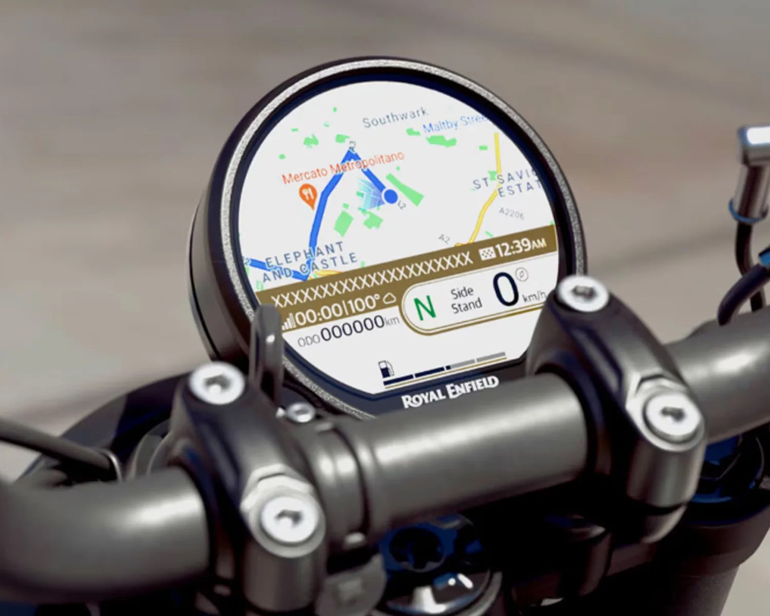 Round digital motorcycle instrument cluster displaying a navigation map with a route, current time (12:39 AM), compass direction (N), side stand status, speed (0 km/h), and odometer reading (000000 km). The display is branded with "Royal Enfield" at the bottom.