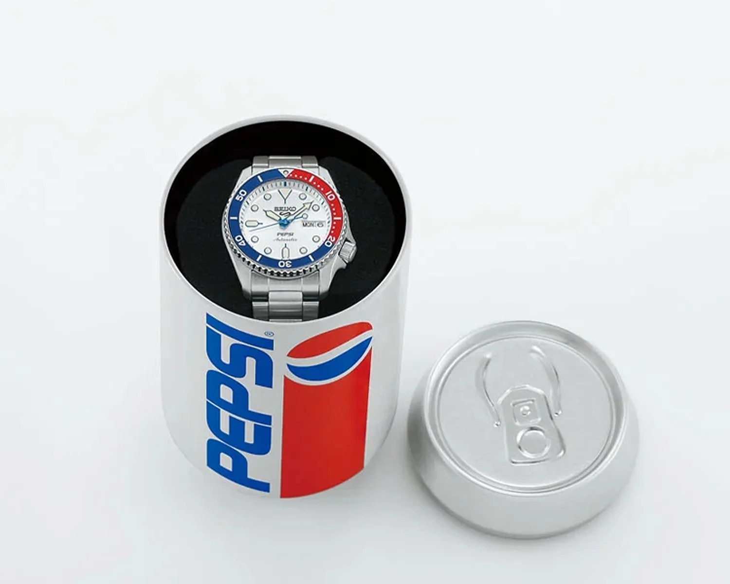 a seiko watch inside a pepsi container