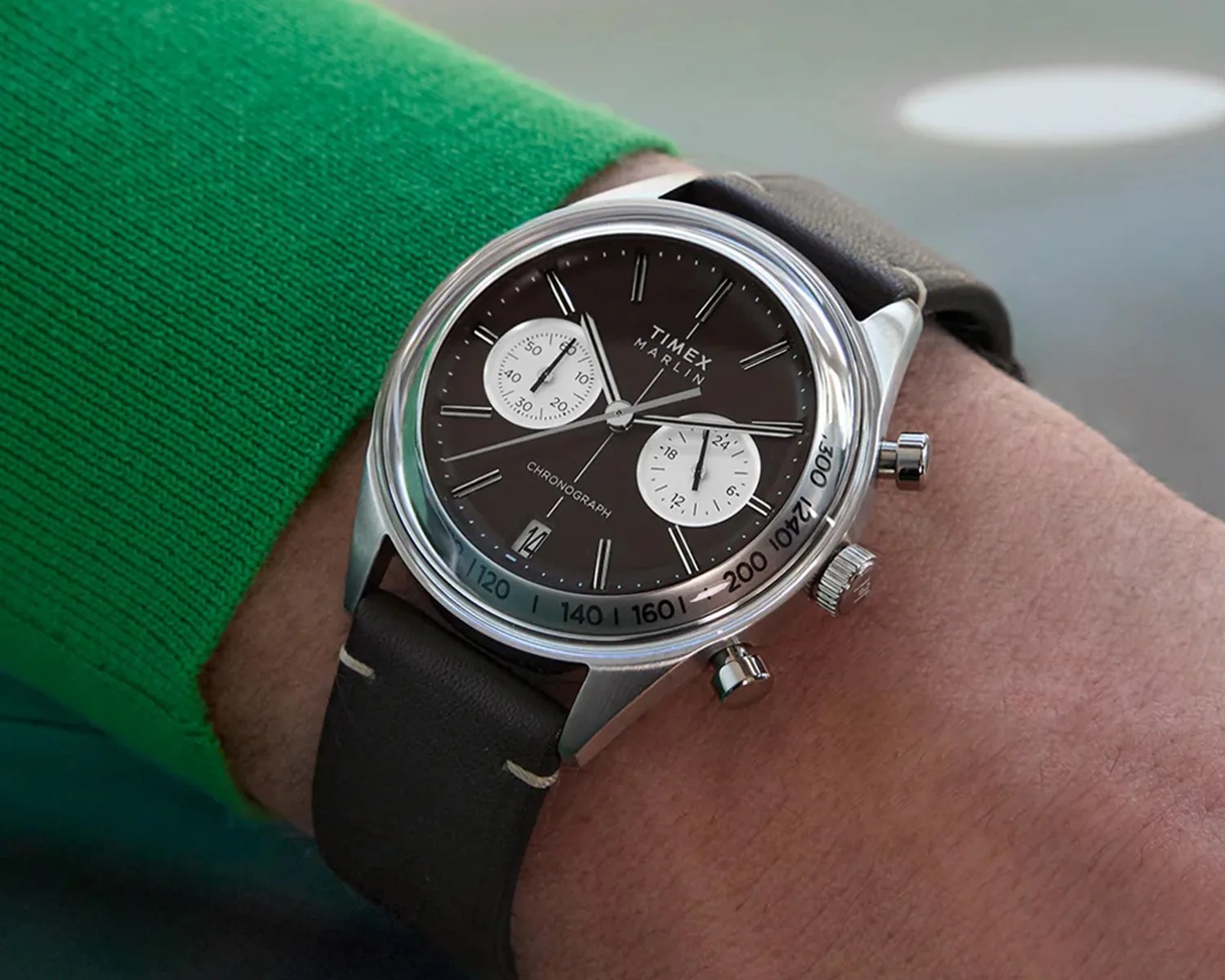 a timex chronograph watch on a mans wrist