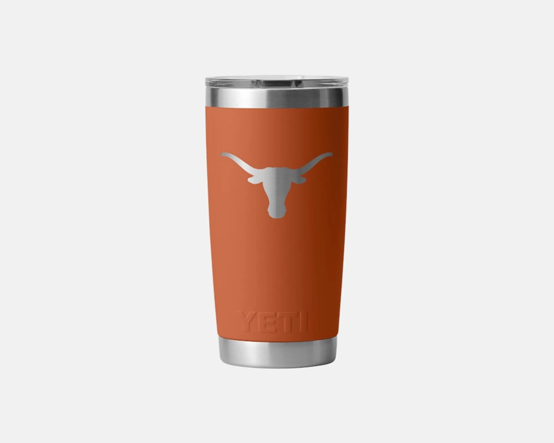 Orange YETI tumbler with a silver longhorn logo on the front and a clear lid.