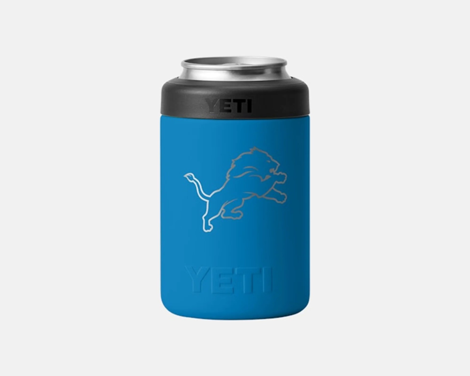 Blue YETI can cooler with a black top and a silver can opening, featuring a silver outline of a lion in a leaping pose on the front.
