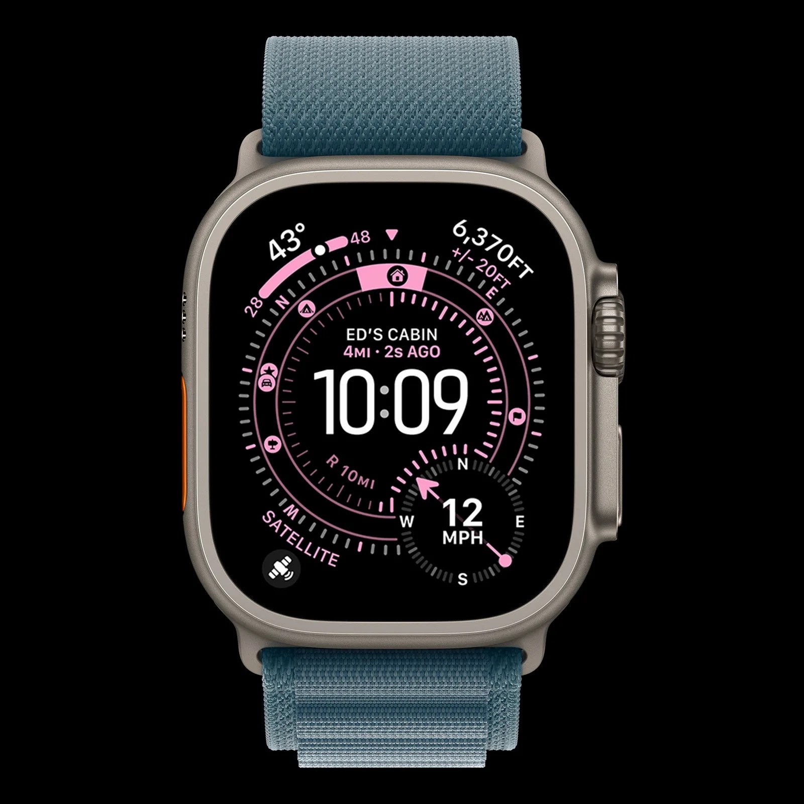 Smartwatch with a rectangular titanium case and a blue fabric strap. The display shows a digital time of 10:09 with navigation and environmental data, including temperature (43°), altitude (6,370 feet), wind speed (12 mph), and a compass. The screen also indicates a location named "ED'S CABIN" 4 miles away, updated 2 seconds ago. The interface uses pink and white accents on a black background.