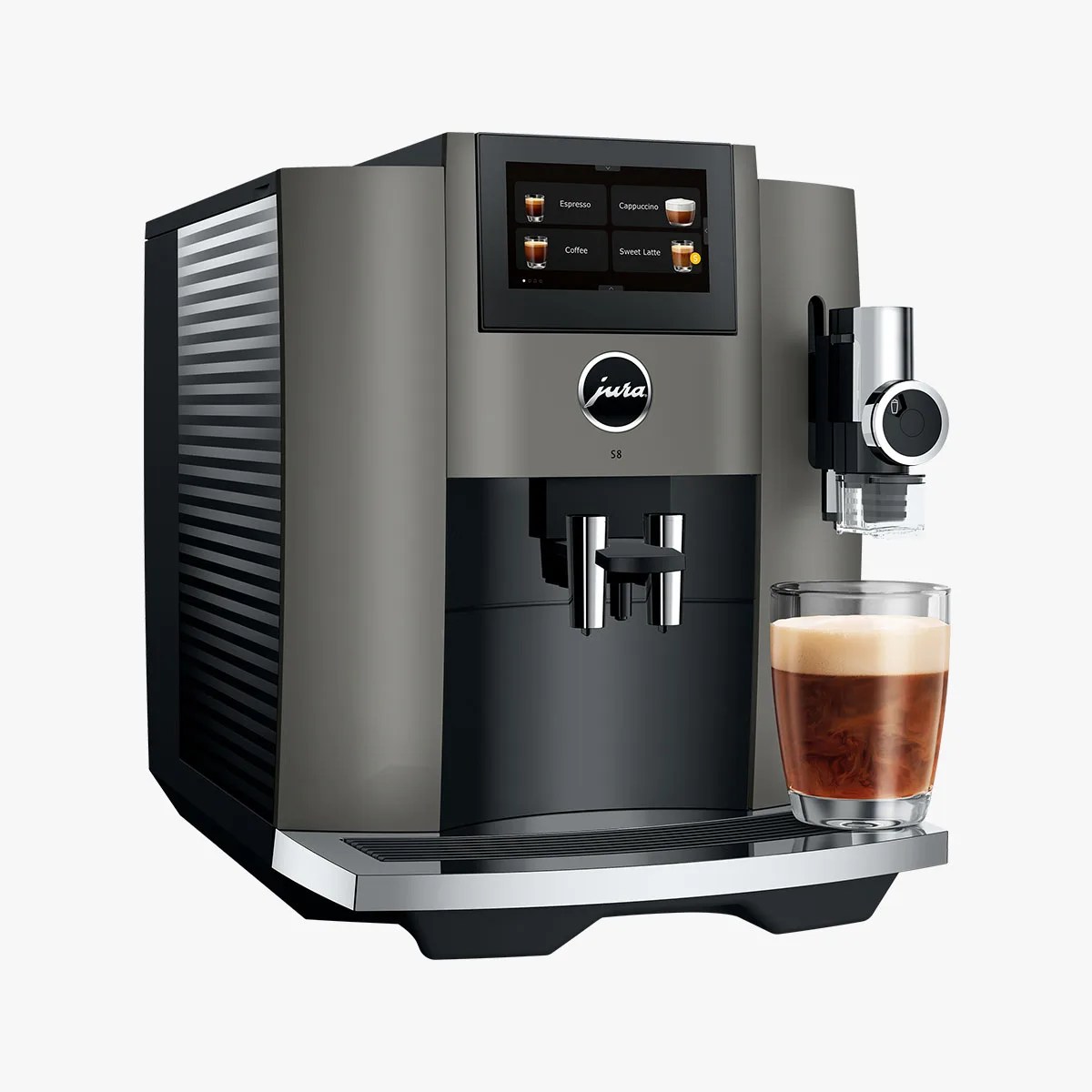 Modern Jura S8 coffee machine in a sleek gray and black design with a digital touchscreen display showing coffee options including Espresso, Cappuccino, Coffee, and Sweet Latte. A glass of coffee with frothy milk is placed on the drip tray beneath the milk frother attachment.
