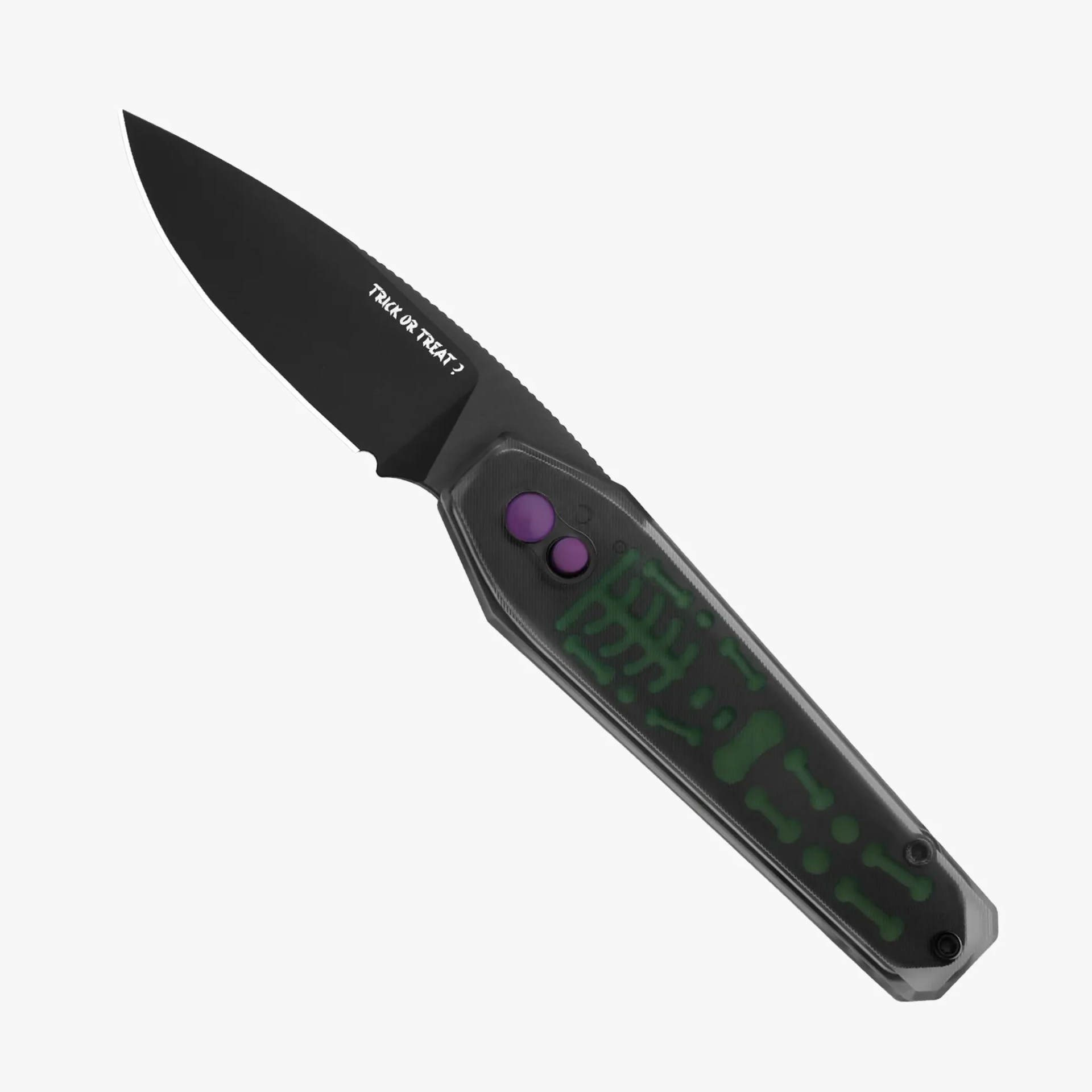 Black folding knife with a matte blade featuring the text "TRICK OR TREAT?" near the handle. The handle is dark with a translucent design showing a green skeleton pattern and has two purple buttons.