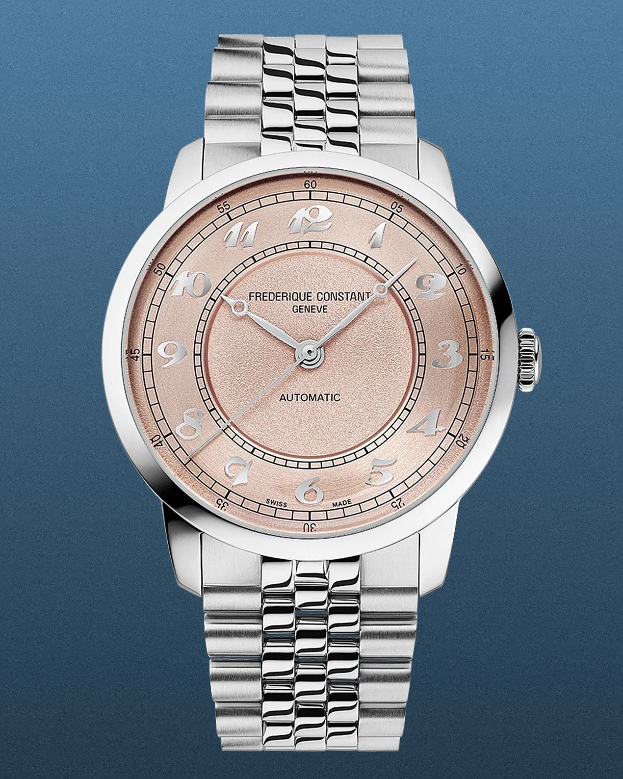 Silver Frederique Constant wristwatch with a textured rose gold dial, featuring silver Arabic numerals and minute markers around the outer rim. The watch has three silver hands and a stainless steel link bracelet. The dial includes the text "FREDERIQUE CONSTANT GENEVE," "AUTOMATIC," and "SWISS MADE.