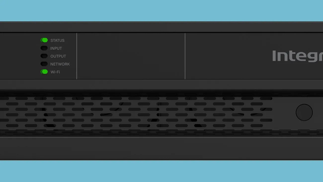 Black electronic device panel with status indicators showing green lights for "STATUS" and "Wi-Fi," and blacked-out lights for "INPUT," "OUTPUT," and "NETWORK." The panel has a perforated vent section and a round button on the right side.