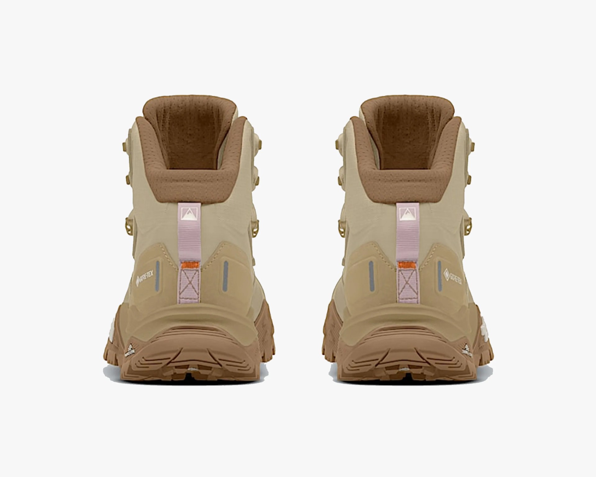 Pair of beige hiking boots shown from the back, featuring brown padded collars, pink pull tabs with a small logo, and rugged brown soles. The boots have Gore-Tex branding on the sides and reflective details near the heel.