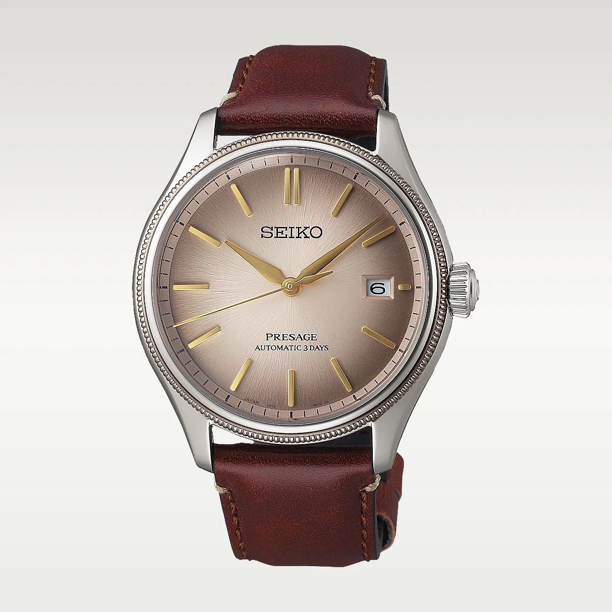Seiko Presage watch with a round silver stainless steel case, a gradient brown sunburst dial, gold-tone hour markers and hands, a date window at 3 o'clock, and a brown leather strap. The dial features the text "SEIKO" at the top and "PRESAGE AUTOMATIC 3 DAYS" at the bottom.
