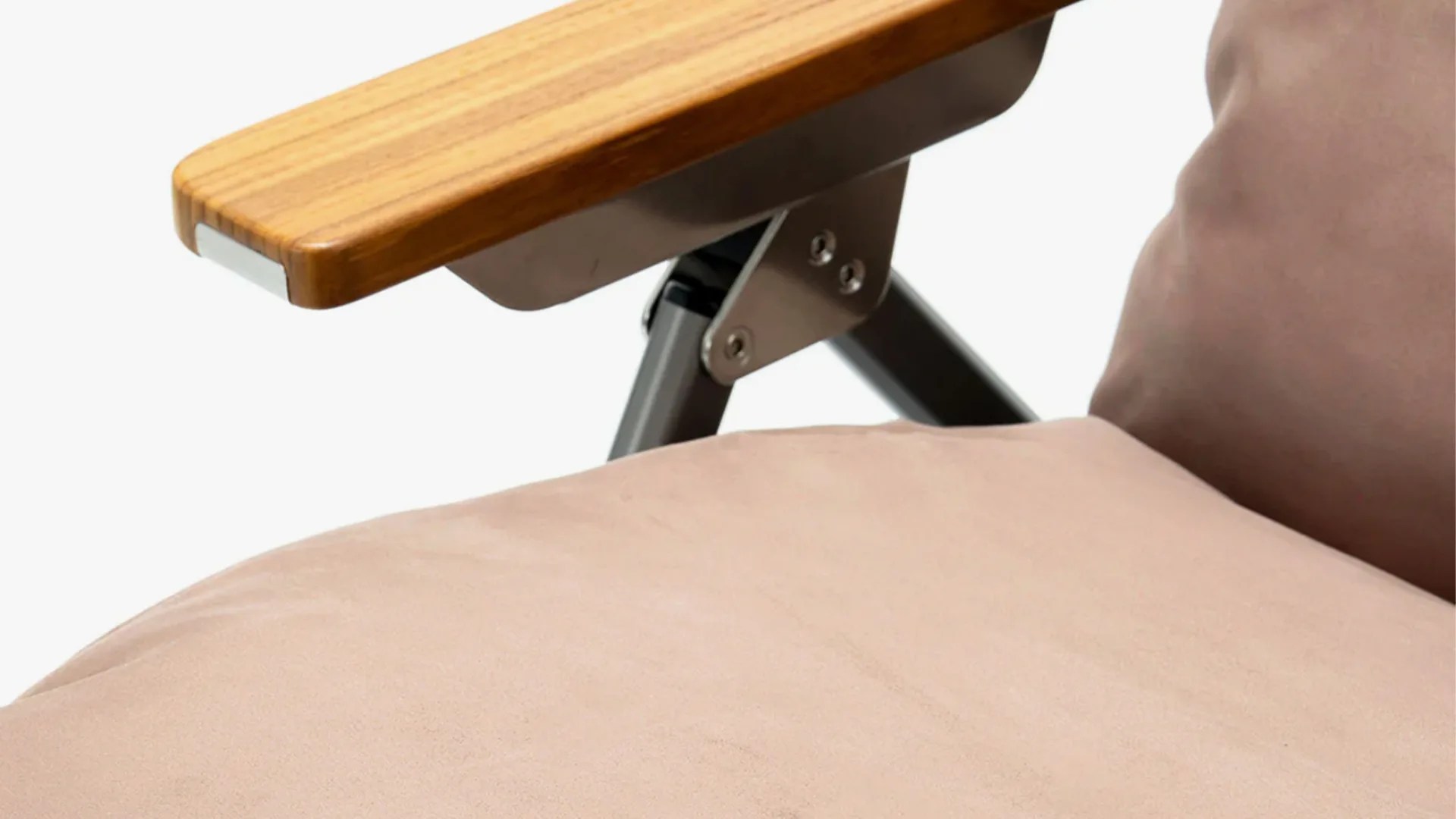 Close-up of a beige cushioned seat with a wooden armrest attached to a metal frame.