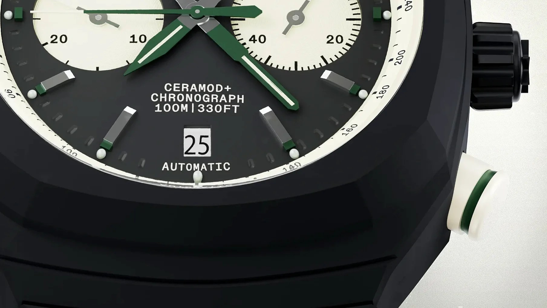 Close-up of a black chronograph watch face with green and white hands and markers. The dial features two subdials with white backgrounds and black markings. Text on the dial reads "CERAMOD+ CHRONOGRAPH 100M | 330FT" and "AUTOMATIC" above and below a date window displaying the number 25. The watch case has a matte black finish with a textured crown and a white pusher with a green ring on the side.