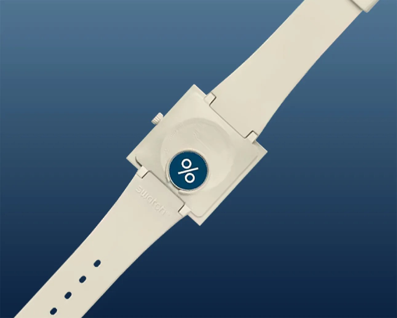 A beige Swatch wristwatch with a square face, featuring a unique design where the watch dial is a small blue circle with a white percentage symbol (%) in the center. The watch has a matching beige strap and a crown on the side. The background is a gradient of dark to light blue.