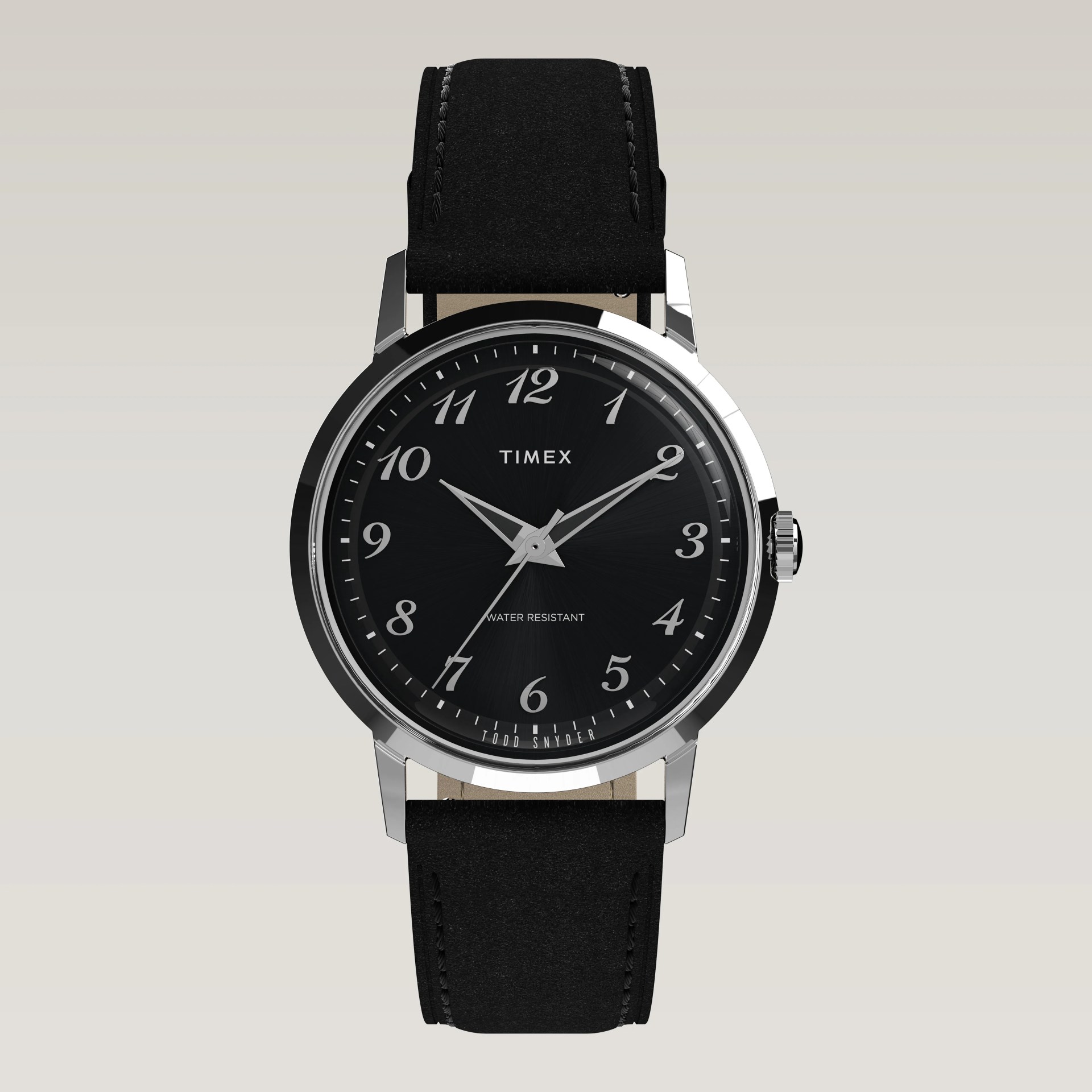 Black Timex wristwatch with a round silver case and black leather strap. The watch face is black with silver Arabic numerals and silver hour, minute, and second hands. The dial includes the text "TIMEX" at the top center, "WATER RESISTANT" near the bottom center, and "TODD SNYDER" along the bottom edge. The watch has a classic, elegant design.
