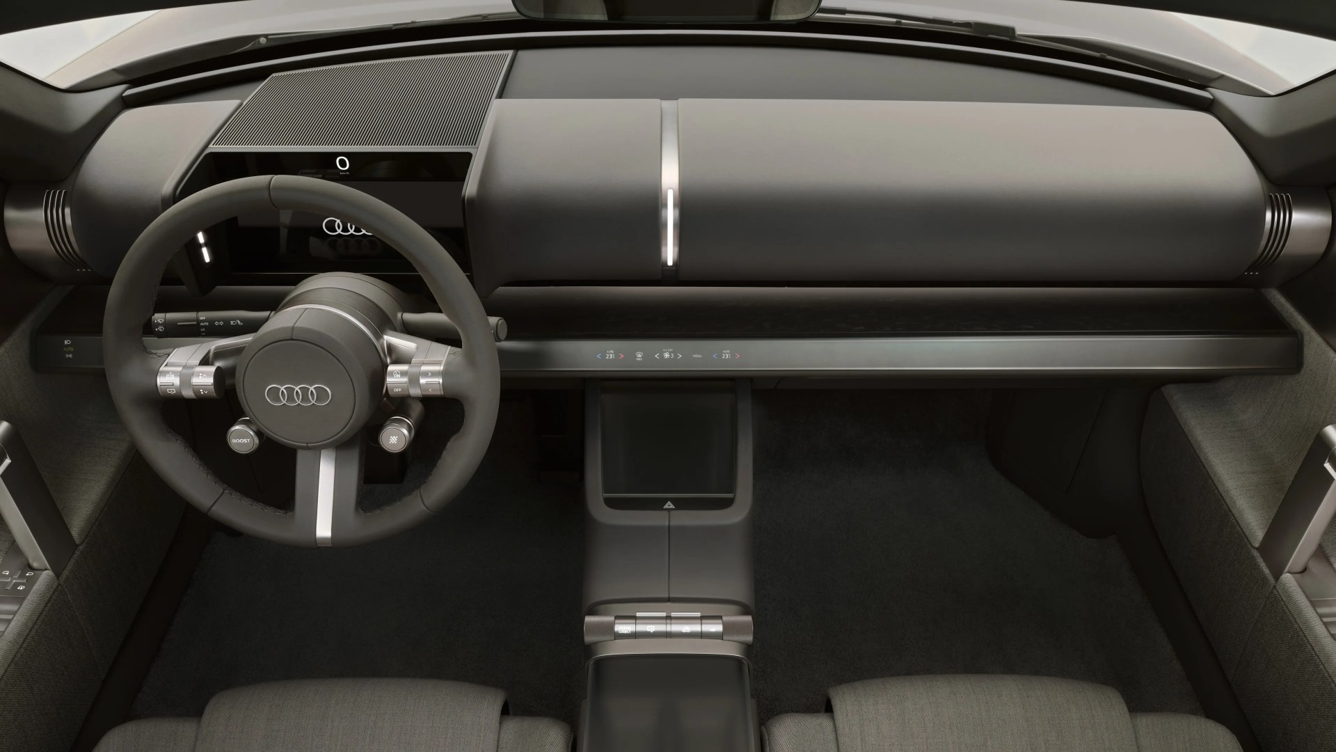 Minimalist Audi car interior with digital steering wheel, horizontal touchscreen display, and fabric seats.