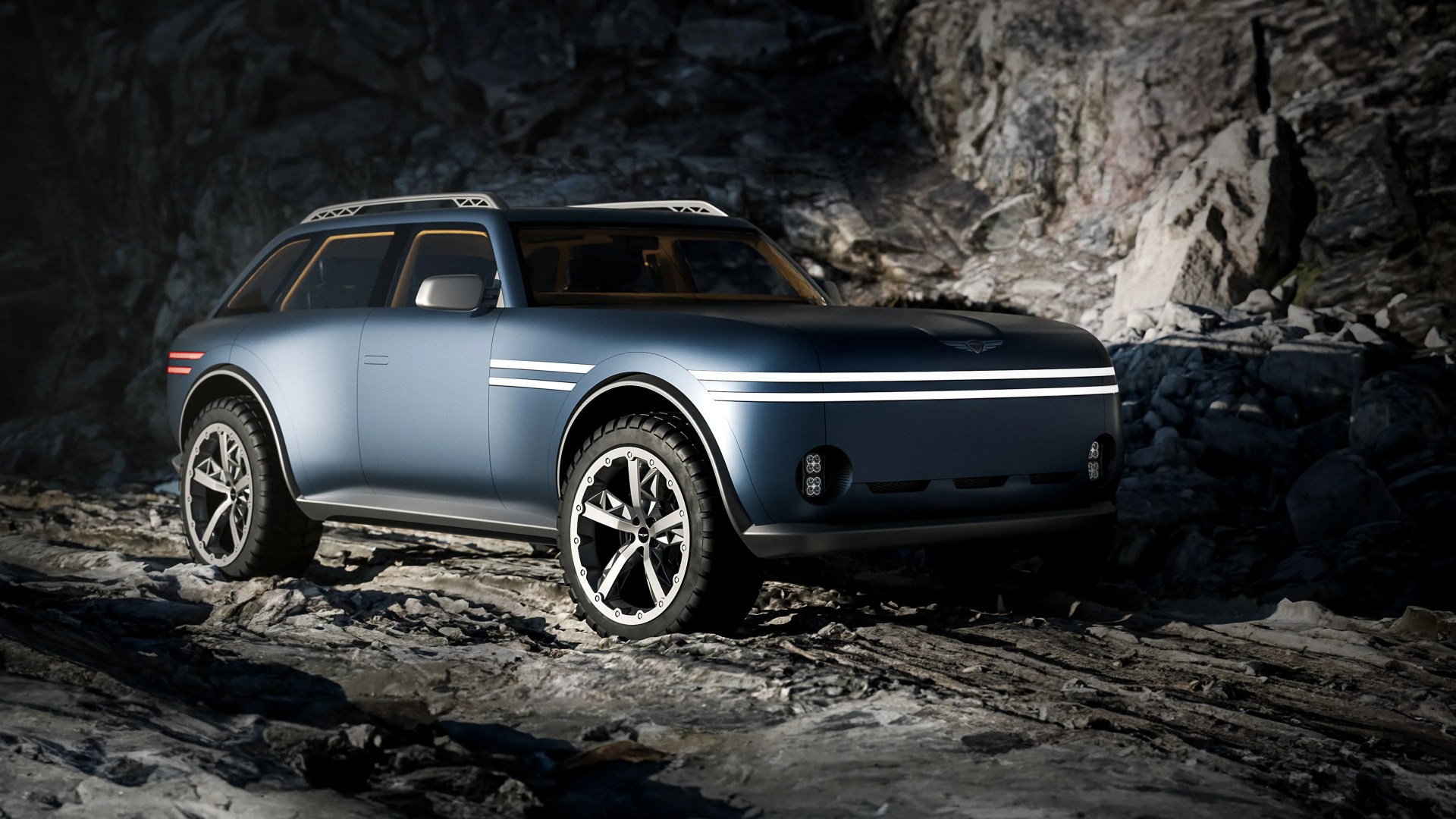 Matte blue electric SUV with white horizontal LED light strips and rugged tires on rocky terrain.