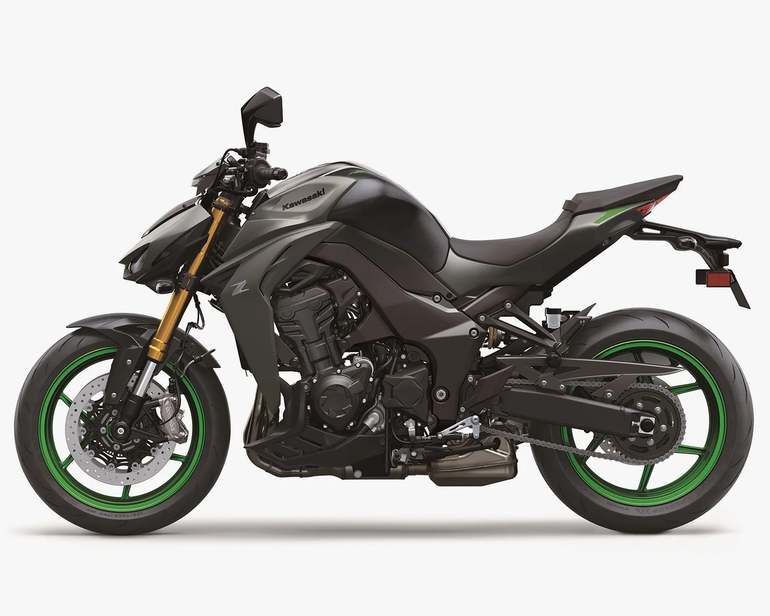Matte black Kawasaki motorcycle with green-rimmed wheels and gold front forks on a white background.