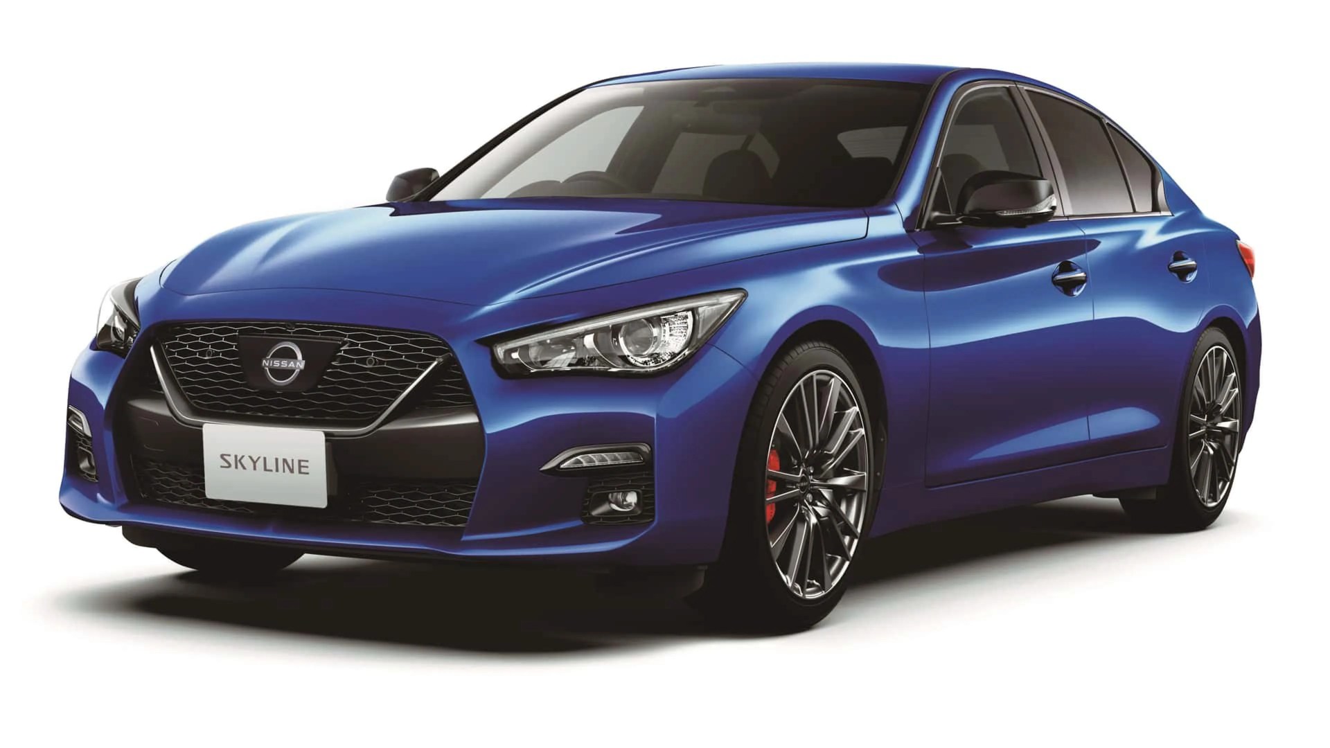 Blue Nissan Skyline sedan with black grille and sporty alloy wheels on a white background.