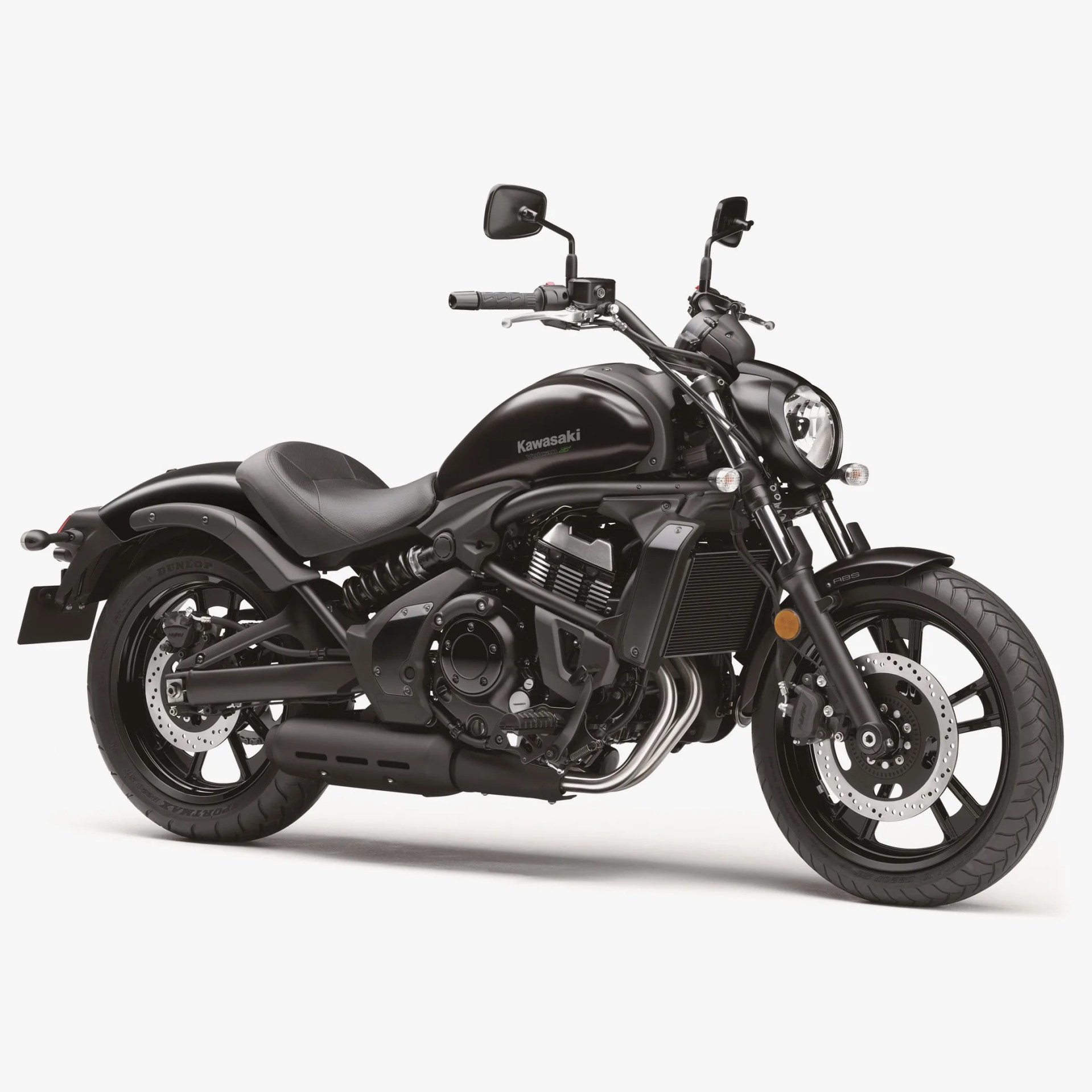 Matte black Kawasaki cruiser motorcycle with low seat and dual rear shocks on a white background.