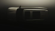 Top-down view of a sleek, modern car roof with two large sunroofs and a small antenna fin.