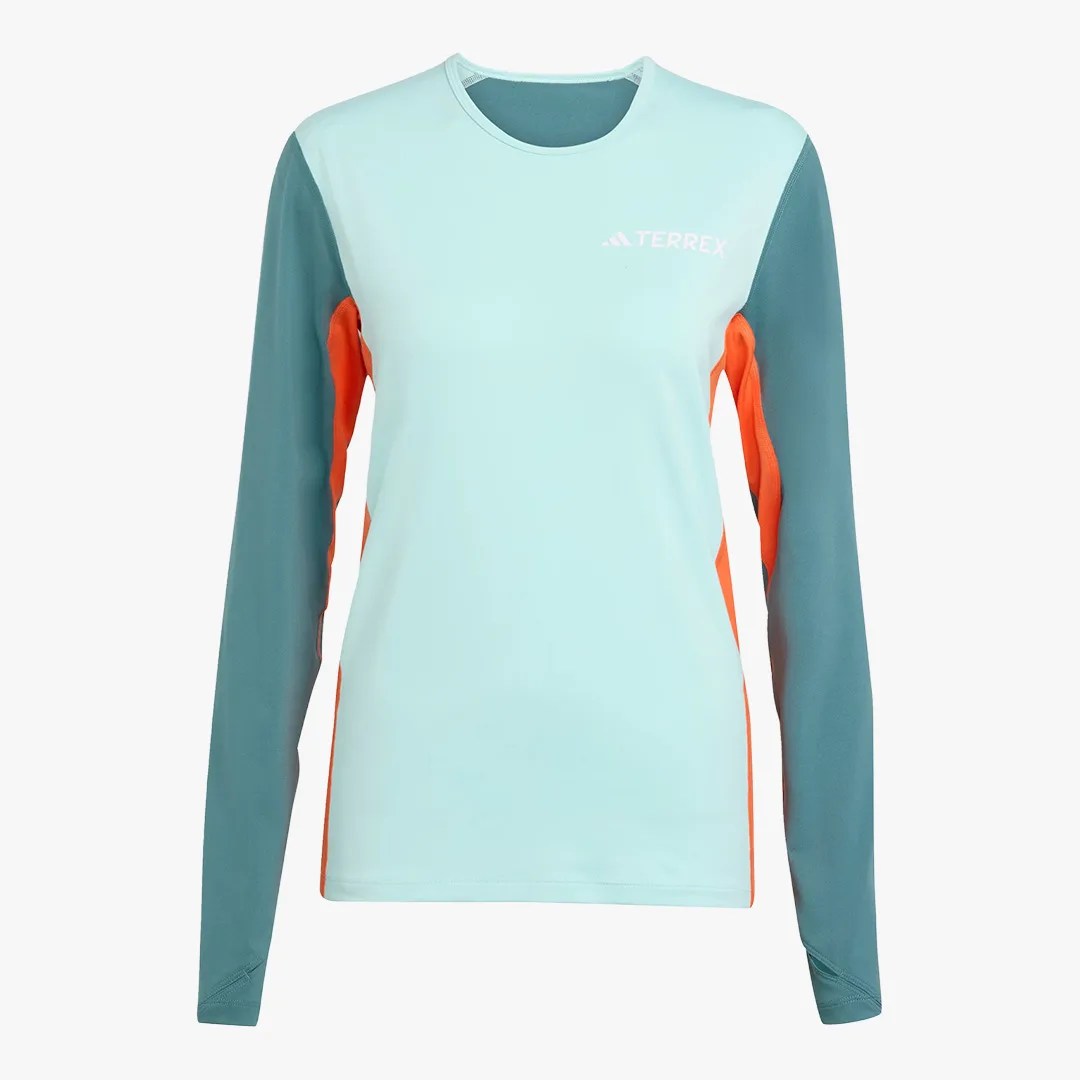Long-sleeve athletic shirt with light blue front, teal sleeves, and orange side panels, featuring a white Terrex logo.