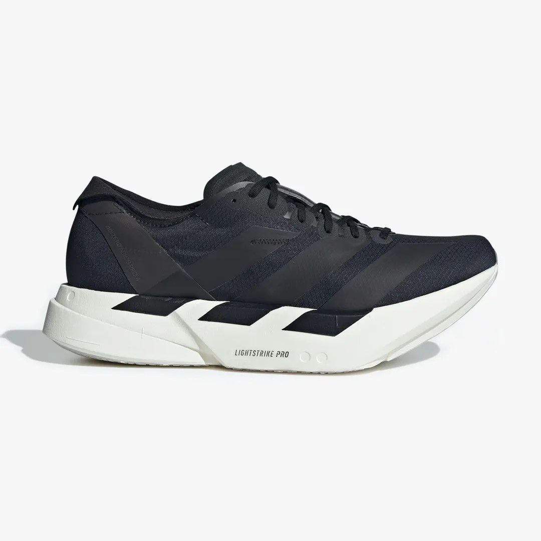 Black low-top running shoe with white chunky sole labeled "Lightstrike Pro" on the side.