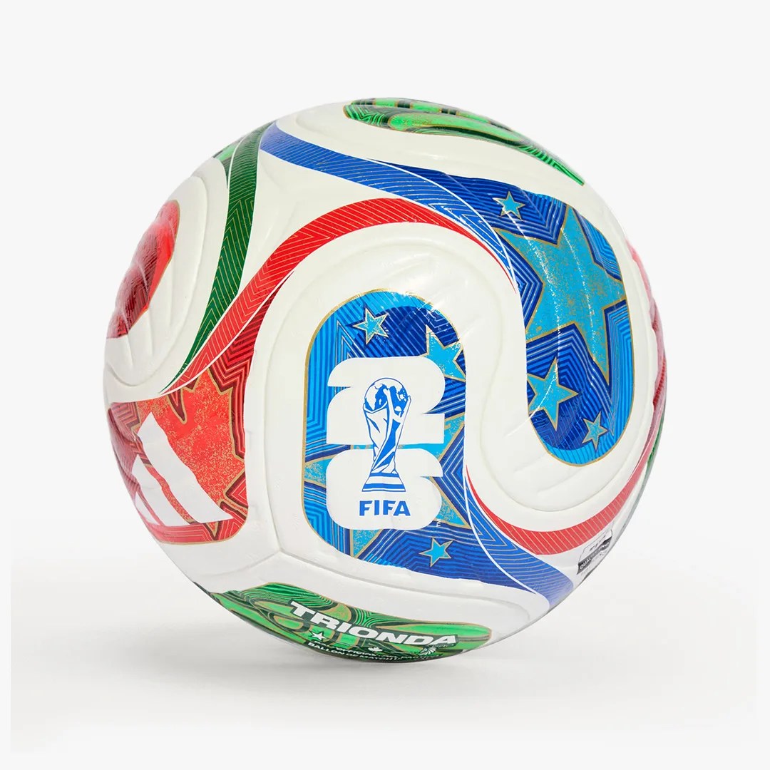 White Adidas FIFA World Cup 2022 soccer ball with colorful red, blue, and green star patterns and FIFA logo.