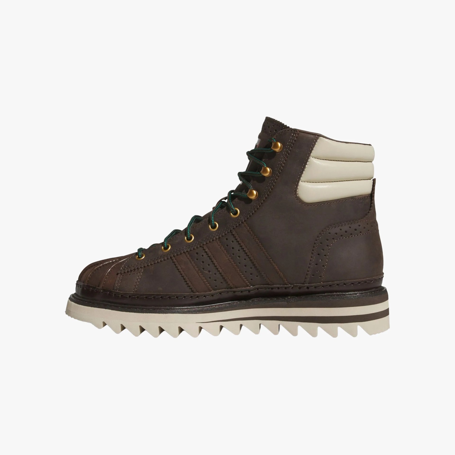 Brown leather high-top boot with cream padded ankle collar and jagged white sole.