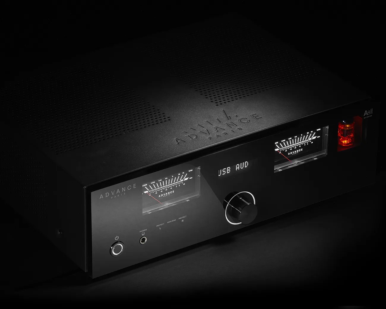 Black Advance Paris A8 integrated amplifier with analog VU meters and digital display showing "USB AUD".