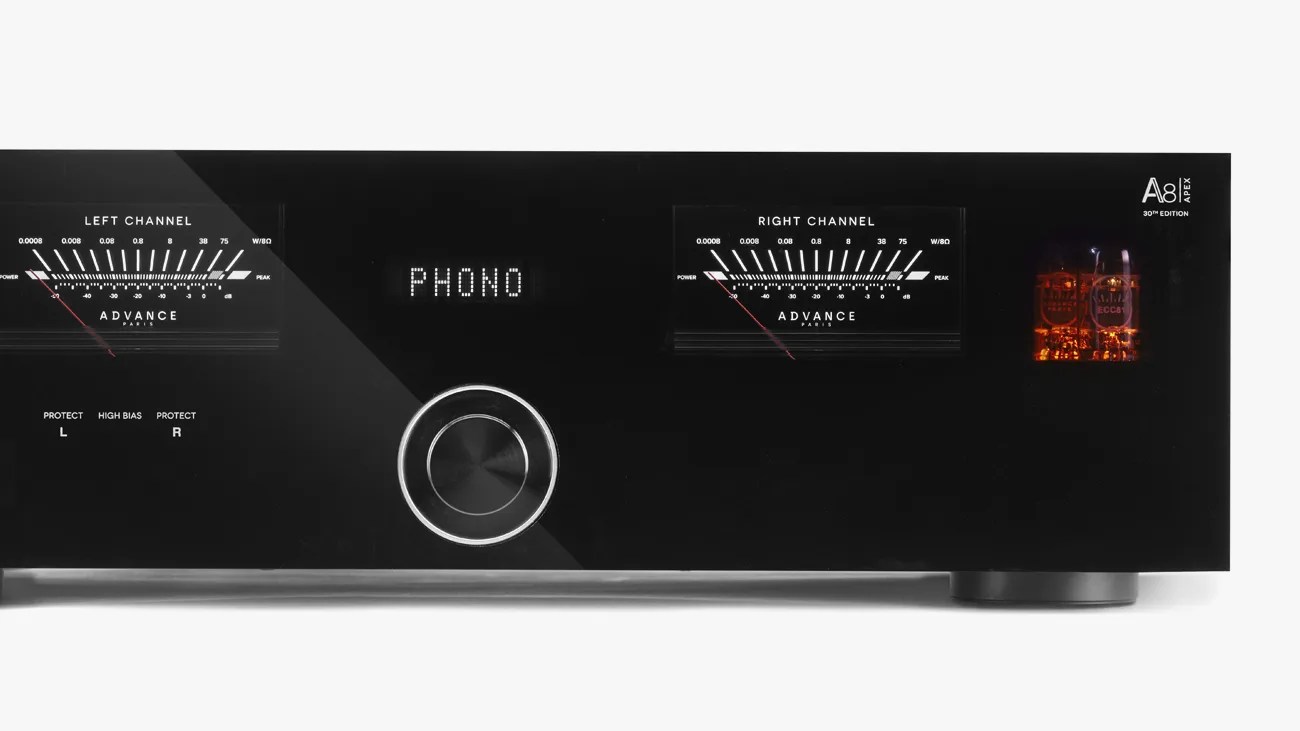 Black Advance Paris A80 Apex 30th Edition audio amplifier with analog VU meters and glowing vacuum tubes.
