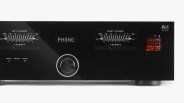 Black Advance Paris A80 Apex 30th Edition audio amplifier with analog VU meters and glowing vacuum tubes.